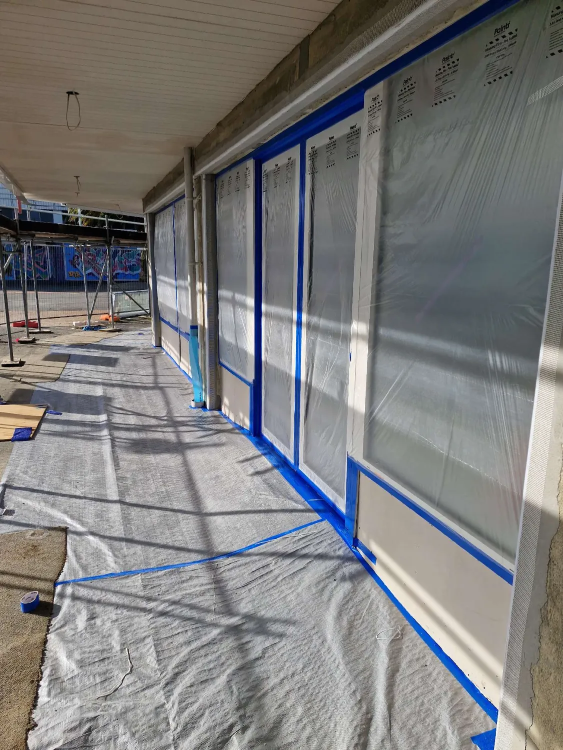 Commercial building after plastering — freshly rendered wall