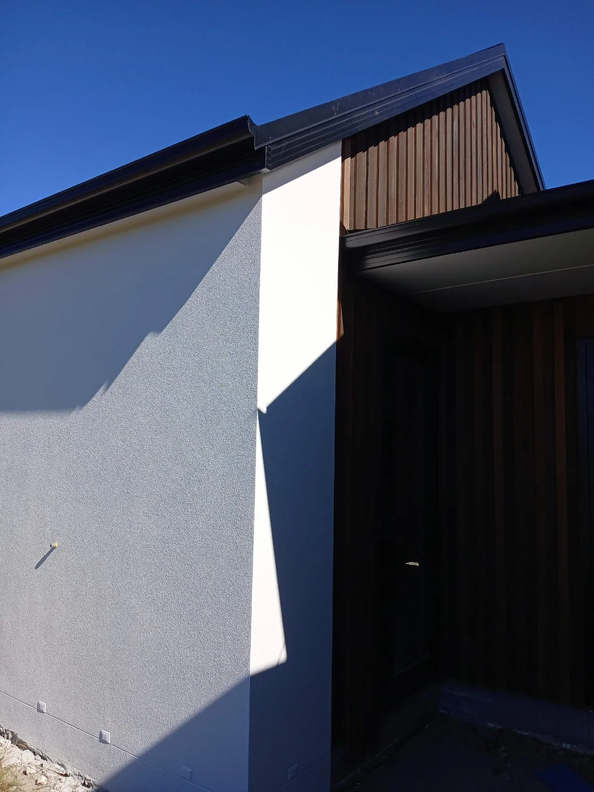 West Melton new build with white render exterior